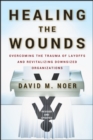 Healing the Wounds : Overcoming the Trauma of Layoffs and Revitalizing Downsized Organizations - eBook