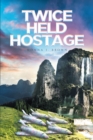 Twice Held Hostage - eBook
