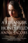 A Stranger in Honeyfield : From the multi-million copy bestselling author - Book