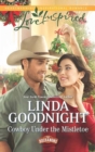 The Cowboy Under The Mistletoe - eBook