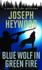 Blue Wolf in Green Fire : A Woods Cop Mystery - Book