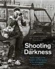 Shooting the Darkness : Iconic images of the Troubles and the stories of the photographers who took them - Book