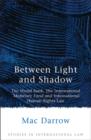 Between Light and Shadow : The World Bank, the International Monetary Fund and International Human Rights Law - Book