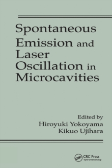 Spontaneous Emission and Laser Oscillation in Microcavities
