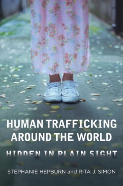 Human Trafficking Around the World : Hidden in Plain Sight, Hardback Book