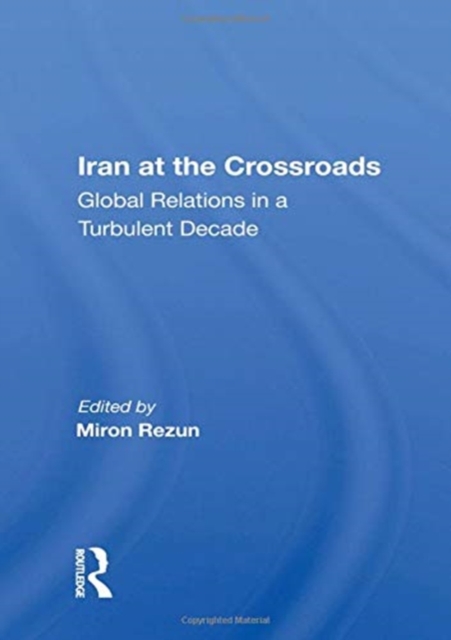 Iran At The Crossroads : Global Relations In A Turbulent Decade, Paperback / softback Book