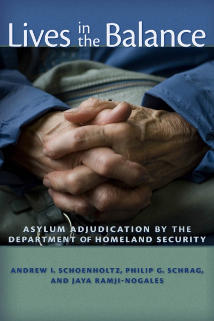 Lives in the Balance : Asylum Adjudication by the Department of Homeland Security, Hardback Book