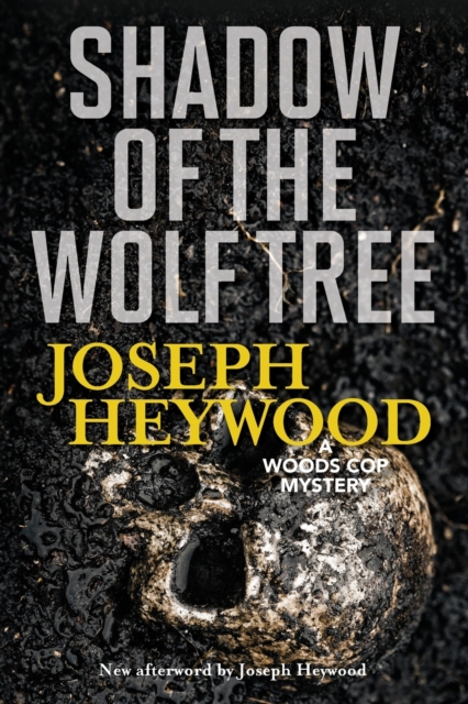 Shadow of the Wolf Tree : A Woods Cop Mystery, Paperback / softback Book