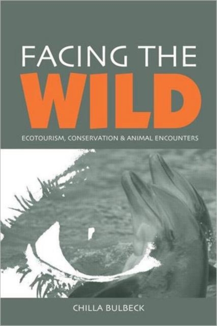 Facing the Wild : Ecotourism, Conservation and Animal Encounters, Paperback / softback Book